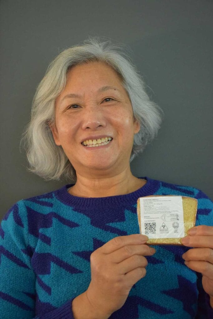 Aunty Mil holding homemade Paradox space cake